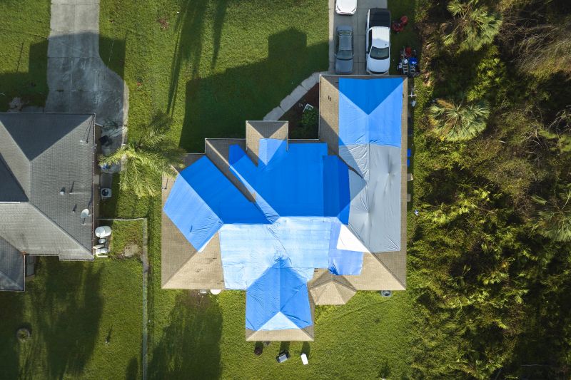 Roof Tarp Installation in Progress