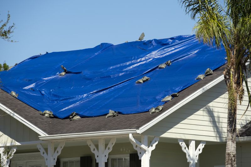 Secured Roof Tarp on Damaged Roof